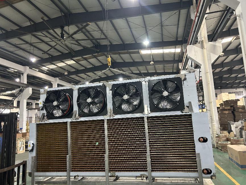 Large blast freezer evaporator unit with four high-velocity fans for rapid heat transfer and fast freezing speed