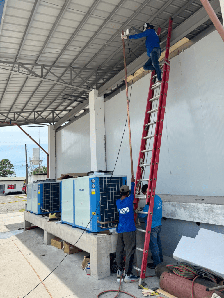 On-site installation of Meluck chiller room insulated panels and condensing units by professional technicians